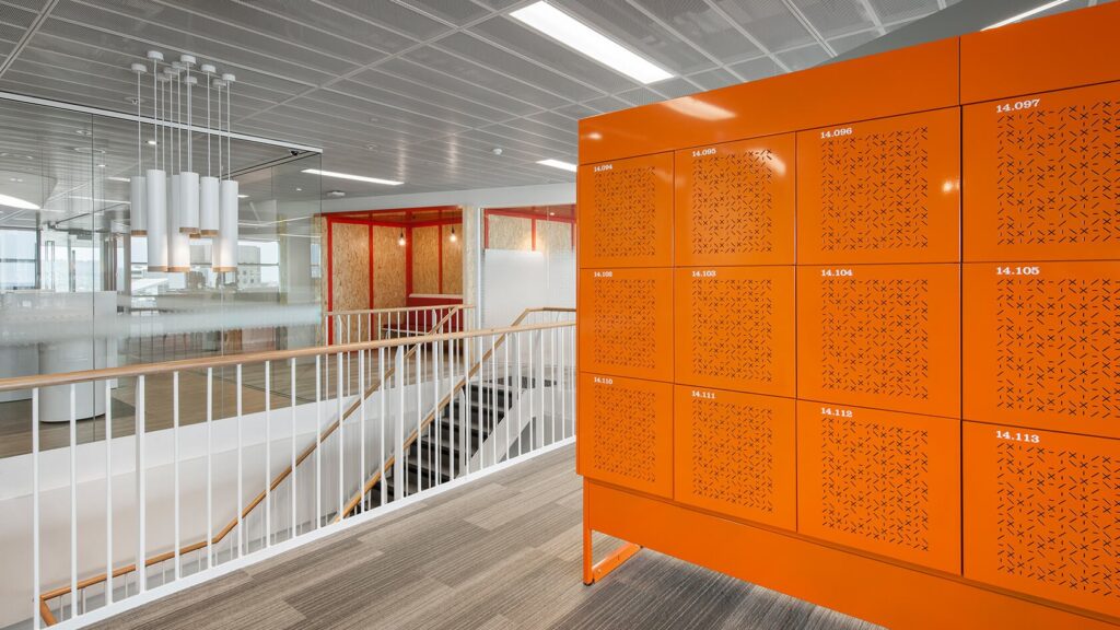 Designer workplace lockers in an office mezzanine