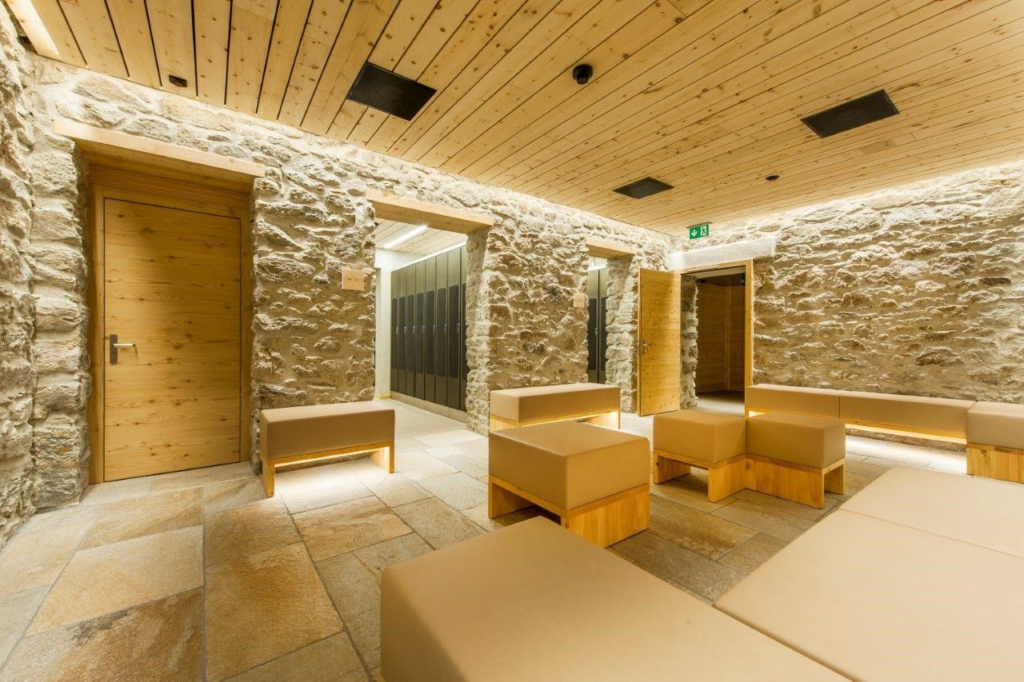 Stone and wood-accented ski locker room